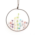 Detailed close-up of handmade tree of life wind chime with colorful crystal stones - Antique Copper + Multicolor
