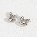 Minimalist silver geometric bean earrings with a polished metallic finish on white background - Smooth Oval Style / Silver