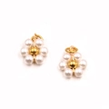 Golden flower earrings with white pearls and central gold bead on white background - Solid Pearl White