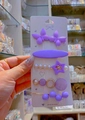 Detail view of 5-piece purple butterfly hair clip set on a white display card - Purple Set A