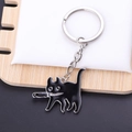 Creative black cat with knife keychain made of titanium steel with drip oil finish - Four-link Chain