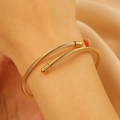Chic golden stainless steel open bangle with twisted rope texture and ball ends - Twisted Rope Round Head (1394)