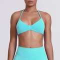 Detailed view of the mint blue seamless ribbed fabric on the halter yoga sports bra - XS / Mint Green