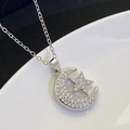 Macro detail of silver moon and star pendant with sparkling pavé zircons on chain - Silver (8303)