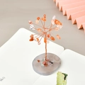 Handcrafted copper wire crystal tree with orange and white gemstones on an agate base - Red Rabbit Hair Quartz