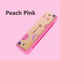 Pink 16-hole wooden harmonica for children with cute giraffe design in peach pink - Peach Blossom Pink