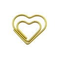Golden heart-shaped paperclip made of polished metal on a clean white background - Gold