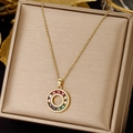 Detail of titanium gold necklace with rainbow gemstone pendant on champagne silk box - Double Circle (XL1494-34)