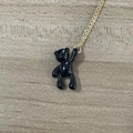 Minimalist gold necklace featuring a cute black glossy bear pendant in a standing pose - Large Bear / Black