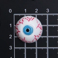 Macro detail of a 2.5cm resin Halloween eyeball accessory with realistic red veins and blue iris - Diameter 2.5cm / L Blue
