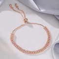 Detail of rose gold double-row crystal tennis bracelet with adjustable bolo pull-string clasp - Double Row Zirconia / Rose Gold