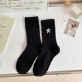 Black mid-calf ribbed cotton socks featuring white star embroidery with AND lettering - One Size / Black