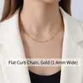 1.4mm curb chain necklace in 18K gold-plated titanium steel worn by model - Gold Curb Flat Chain