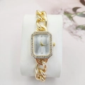 Elegant gold rectangular watch with diamond bezel and metal chain strap on a white pillow - Gold Case White Dial