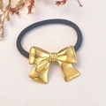 Elastic black hair tie featuring a polished gold metallic bow charm for women - Gold 3D Bowknot