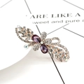 Barrette à cheveux nœud en or rose avec strass clairs et cristaux violets sur blanc - Glycine