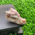 Natural 1.5-inch red and white textured agate stone dragon head carving on wood base - Red Grid Jasper