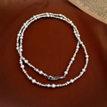 Detail of silver beads and white pearls necklace with a vintage clasp on dark wood - Silver Long Pearl Splicing Double Layer Style (HN4693)