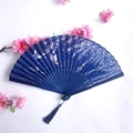 Navy blue bamboo folding fan with silver butterfly patterns and matching silk tassel - Dark Blue & Silver Butterfly Cherry Blossom Style (Women's Folding Fan - 09)