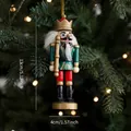Klassischer 13cm Nussknacker-König in Rot und Gold am Weihnachtsbaum aufgehängt - Grüner König