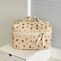Beauty case trapuntato beige con motivo a orsetto e comodo cinturino per il trasporto - Beauty case / Orso bruno