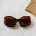 Occhiali da sole cat-eye eleganti con montatura tartarugata marrone e lenti color tè - Tè Scuro Trasparente
