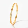 Gold open bangle with double grooves and centered sparkling cubic zirconia row - SAK945 Gold (SAK945) / Gold