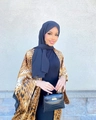 Classic black bubble chiffon hijab styled with a leopard print abaya and handbag - 175*75cm / Navy Blue