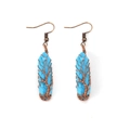 Detail of tree of life wire-wrapped long drop earrings with blue stone pendants - Turquoise