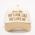 Close-up of high-density embroidery on two-tone cotton baseball cap with text details - Off-White/Dark Khaki