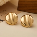 Minimalist 18K gold-plated irregular wavy disc stud earrings on a neutral background - Irregular / Gold Irregular Round