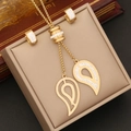 Golden jewelry set with leaf charms and star accents on a premium beige display box - Waterdrop Leaf (2#)