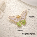 Exquisite butterfly pendant with purple enamel and tiny rhinestones in golden finish - Green Rhinestone Butterfly