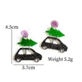 Detail view of 4.5cm Christmas tree acrylic earrings with purple and black glitter accents - Christmas Tree with Car