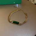 Gold Cuban link bracelet featuring a large emerald green rectangular gemstone center - 44# Gold Green Emerald Cuban