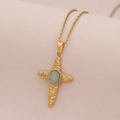 Golden stainless steel necklace with a blue natural stone cross pendant on beige fabric - 4# Blue Aventurine