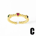 Gold adjustable ring featuring beaded band and three colorful heart-shaped gemstones - Heart Multi-color Stone Style (C)