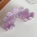 Large acetate hair claw clip featuring a marbled purple and pink petal design finish - Purple