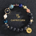 Capricorn beaded bracelet with black lava rocks, blue sandstone, and gold star charms - Capricorn-Lava Stone