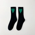 Mid-calf black cotton socks featuring a vibrant green heart pattern for a stylish look - Black