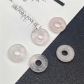 Pink natural quartz donut beads for DIY jewelry making on black and white background - Rose Quartz 1PC