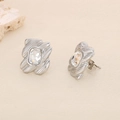 Macro view of geometric silver titanium earrings with radiant crystal and wavy texture - Steel Wavy Square Zircon Style (KE116429-KFC)