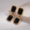 Macro shot of vintage gold earrings with large black rectangular crystal stones - Black Gold Geometric Earrings (925 Silver Needle)