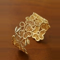 Retro 18k gold plated open cuff bracelet with intricate hollow floral filigree patterns - Gold