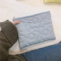 Detail of light blue quilted down clutch bag with soft floral embroidery and metal zipper - Sky Blue
