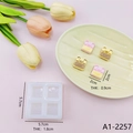 Detailed view of pig silicone mold dimensions with cute pink and yellow resin samples - Mini Cartoon Animal A1-2257