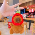 Plush capybara keychain wearing a cute red strawberry hat with a golden metal hook - Costume Capybara-Strawberry