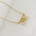 Collier en acier inoxydable 18K doré avec pendentif année 2002 au style minimaliste - 2012