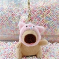 Plush capybara keychain wearing pink pig costume with gold metal ring detail - Pig Hat Light Brown + Gold Clip