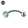 G23 titanium eyebrow ring with sky blue zircon inlay on a curved barbell piercing - Aquamarine